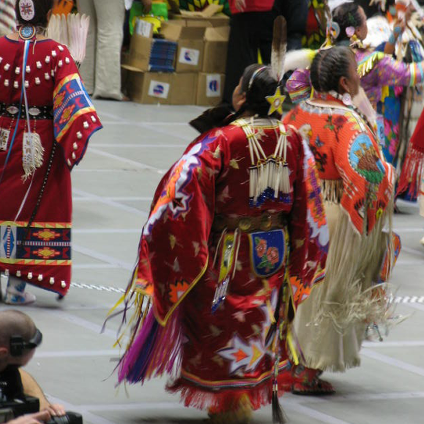 Indigenous women wearing Indigenous attire