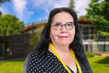 Margaret Moss in front of First Nations House of Learning at UBC