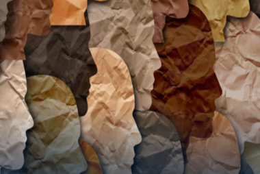 Crumpled paper cutouts of people in browns and tans