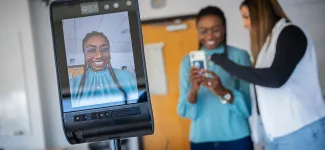 Students test robotic communication device