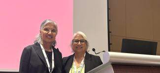 Balbir Gurm and Ranjit Kaur Dhari at the podium