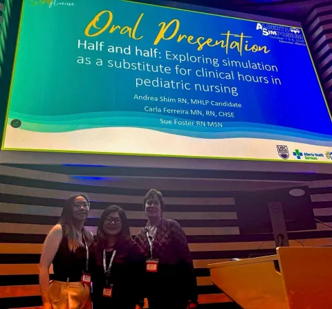 Andrea, Carla and Sue present at symposium