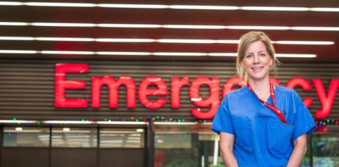 Lara Gurney stands outside the hospital